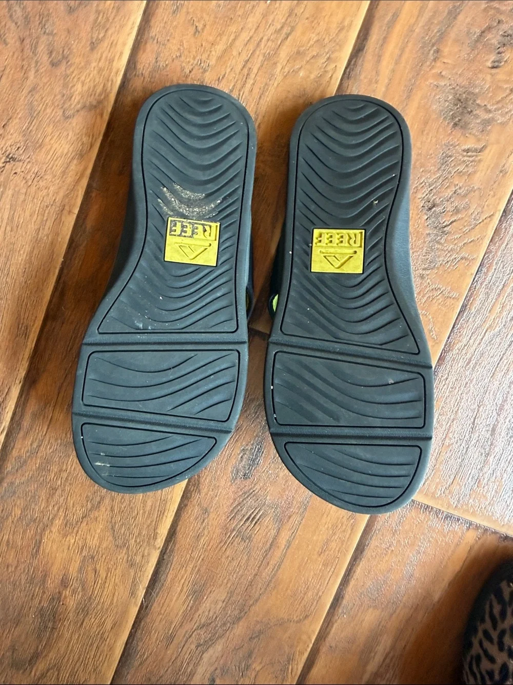 Reef Men’s Navy Flip Flops with Yellow Trim